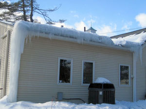 Severe ice damming due to poor roof insulation