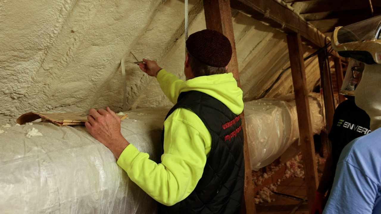 Spray foam insulation retro-fit college dormitory